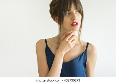 image of attractive young  woman thinking 
