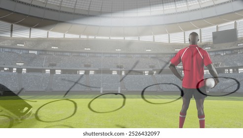 Image of a back view of an African American male rugby player standing, holding a ball in his hand and looking around with hand drawn game plan and whistle in the foreground and sports stadium in the - Powered by Shutterstock