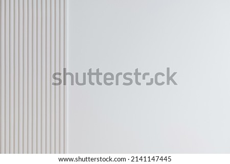 image for background. white wall and white vertical stripes on the edge