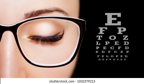 Image Of A Beautiful Young Girl Wearing Glasses. Close Up Shot