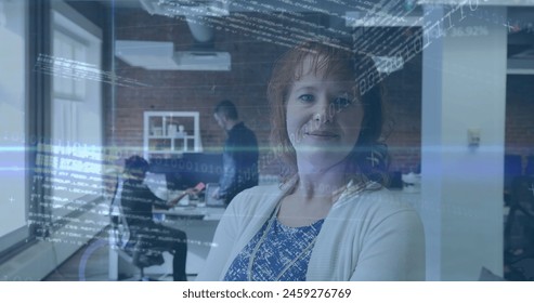 Image of binary codes, computer language, trading board over caucasian woman standing in office. Digital composite, multiple exposure, coding, machine learning, stock market and technology.