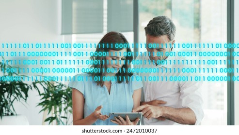 Image of binary codes over caucasian coworkers discussing reports on digital tablet. Digital composite, multiple exposure, business, coding, computer language, teamwork and technology concept.