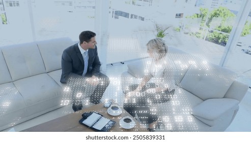 Image of binary coding data processing over diverse business people in office. Global finance, business, connections, computing and data processing concept digitally generated image.