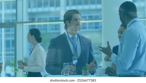 Image of binary coding data processing over diverse businesspeople discussing at office. Computer interface and business technology concept