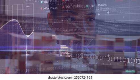 Image of binary coding and data processing over biracial businesswoman in office. Business, finance, data processing and networking concept digitally generated image.