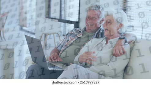 Image of binary coding over senior caucasian couple using laptop. global connections, digital interface and technology concept digitally generated image.