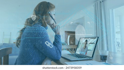 Image of biometric fingerprint over businesswoman using phone headset and laptop. global online security, data processing, digital interface and technology concept digitally generated image. - Powered by Shutterstock