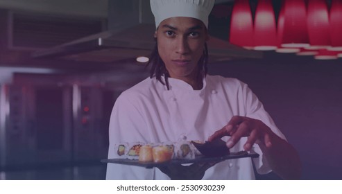 Image of biracial male chef preparing sushi. social media and communication interface concept digitally generated image. - Powered by Shutterstock