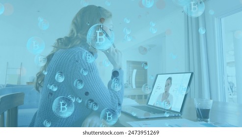 Image of bitcoin symbols over businesswoman using phone headset and laptop. global cryptocurrency, data processing, digital interface and technology concept digitally generated image. - Powered by Shutterstock - Get 15% off with code: PIKWIZARD15