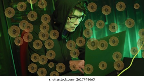 Image of bitcoins over asian male hacker in server room. global technology and digital interface concept digitally generated image.