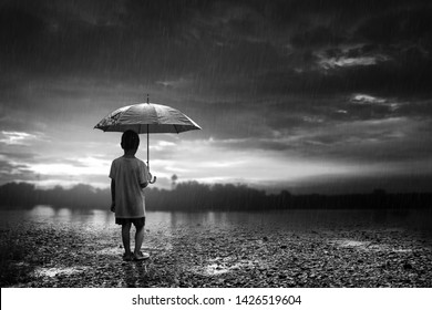 girl walking alone in rain