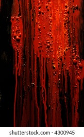 Image Of Blood And Guts Splattered Against A Black Surface.  Background Image For Horror / Halloween, Etc.