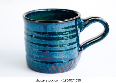 An Image Of Blue Handmade Mug On White Background