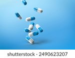 Image of Blue Pills On a Isolated Blue Background. Blue Pharmaceutical Capsules Floating on Air.