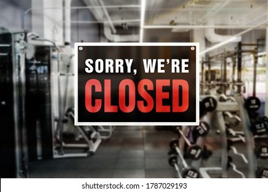 Image Of A Blurred Gym Background With Closed Sign In Front.