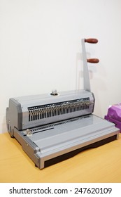 The Image Of A Bookbinding Machine. Stitcher