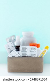 Image Of A Box Of Compounded Prescription Medications Shipped From A Mail Order Pharmacy On A Lihgt Blue Background.