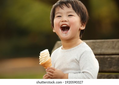 Image Of A Boy Eating Soft Serve Ice Cream