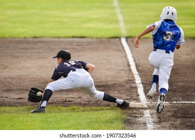 Image Of A Boy Playing Baseball.