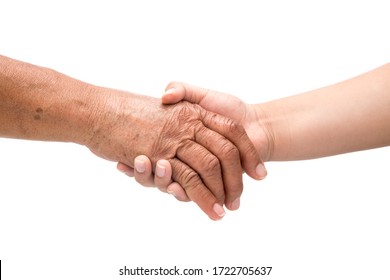 An image of a boy's hand holding her grandmother's hand, preserving the concept of age and skin differences, on white background. - Powered by Shutterstock