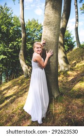 an image of bride at the tree