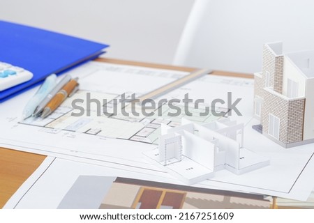 Image of building a meeting with a housing drawing written in Japanese