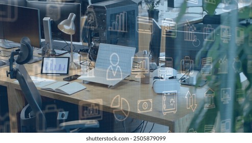 Image of business icons and data processing over computer on office desk. Global finance, business, connections, computing and data processing concept digitally generated image.