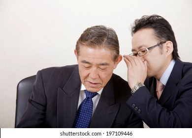 An Image Of Business Man Whispering