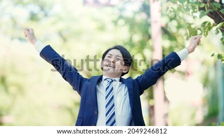 Image of a businessman doing stretching