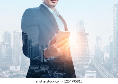 Photo Businessman Holding Smart Phone Double Stock Photo (Edit Now ...