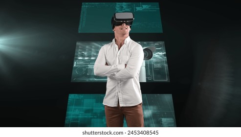 Image of businessman wearing vr headset over screens with data processing. global technology, connections and data processing concept digitally generated image.