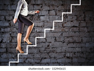Image of businesswoman climbing career ladder. Success and achievement