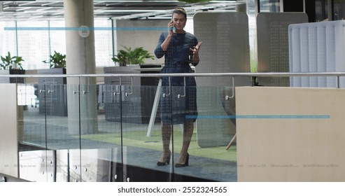 Image of businesswoman in office with data processing overlay. technology, communication, professional, corporate, workplace, digital - Powered by Shutterstock