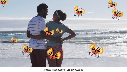 Image of butterflies over back view of african american couple embracing at beach. love and romantic relationship concept digitally generated image. - Powered by Shutterstock