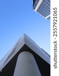 The image captures the sharp angle of a building