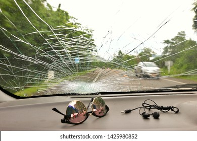Image of car windshield cracking  The cause of rock fragments bumps.