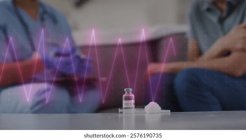 Image of cardiograph over diverse doctor and patient. Global healthcare, medicine, lifestyle and digital interface concept digitally generated image. - Powered by Shutterstock - Get 15% off with code: PIKWIZARD15