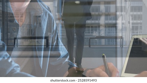 Image of caucasian businessman walking over businessman writing. Global business and digital interface concept digitally generated image. - Powered by Shutterstock