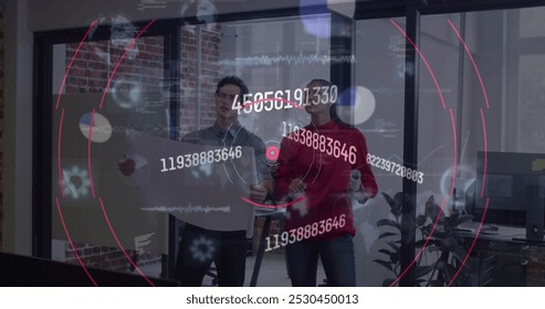 Image of changing numbers and data processing over diverse colleagues discussing at office. Global economy and business technology concept - Powered by Shutterstock