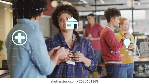 Image of changing numbers and icons over diverse coworkers discussing during tea break. Digital composite, multiple exposure, business, growth, beverage, idea, medical and technology concept. - Powered by Shutterstock - Get 15% off with code: PIKWIZARD15