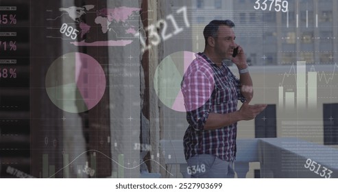 Image of changing numbers, infographic interface, frustrated caucasian man talking on cellphone. Digital composite, multiple exposure, report, business, global and technology concept. - Powered by Shutterstock