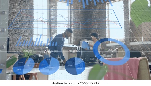 Image of charts processing data over diverse colleagues unpacking at casual office. Teamwork, connection, business, digital interface and communication, digitally generated image.