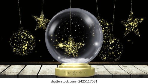 Image of christmas snow globe with snow falling and baubles on black background. Christmas, festivity, tradition and celebration concept digitally generated image. - Powered by Shutterstock