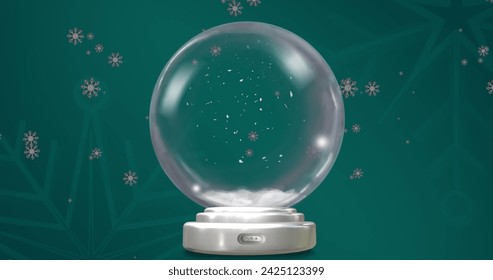 Image of christmas snow globe with snow falling on green background. Christmas, festivity, tradition and celebration concept digitally generated image. - Powered by Shutterstock