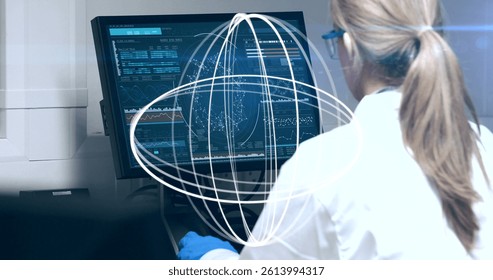 Image of circles spinning over female scientist using computer. global science, research, data processing and digital interface concept digitally generated image.