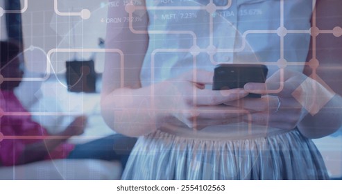 Image of circuit board with data processing over caucasian businesswoman using smartphone. Global finance, business, connections, computing and data processing concept digitally generated image. - Powered by Shutterstock