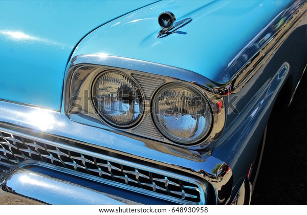 An image of a classic car headlight - muscle\
car - Kaunitz/Germany - 2017 May\
27.