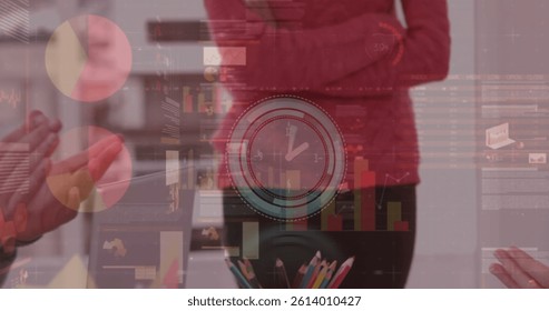 Image of clock, statistics and data processing over business people clapping in meeting. global business, data processing and digital interface concept digitally generated image.