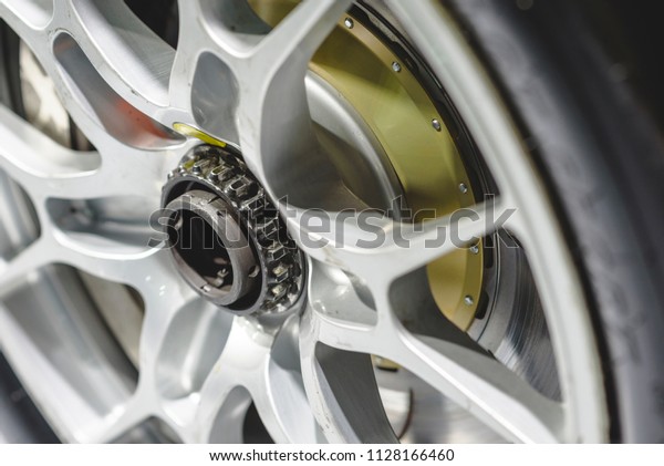 image\
close up of center lock wheel hub for race\
car.