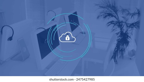 Image of cloud icon and scope over computers in office, copy space. Global connections, business, finance, digital interface, cloud computing and data processing concept digitally generated image